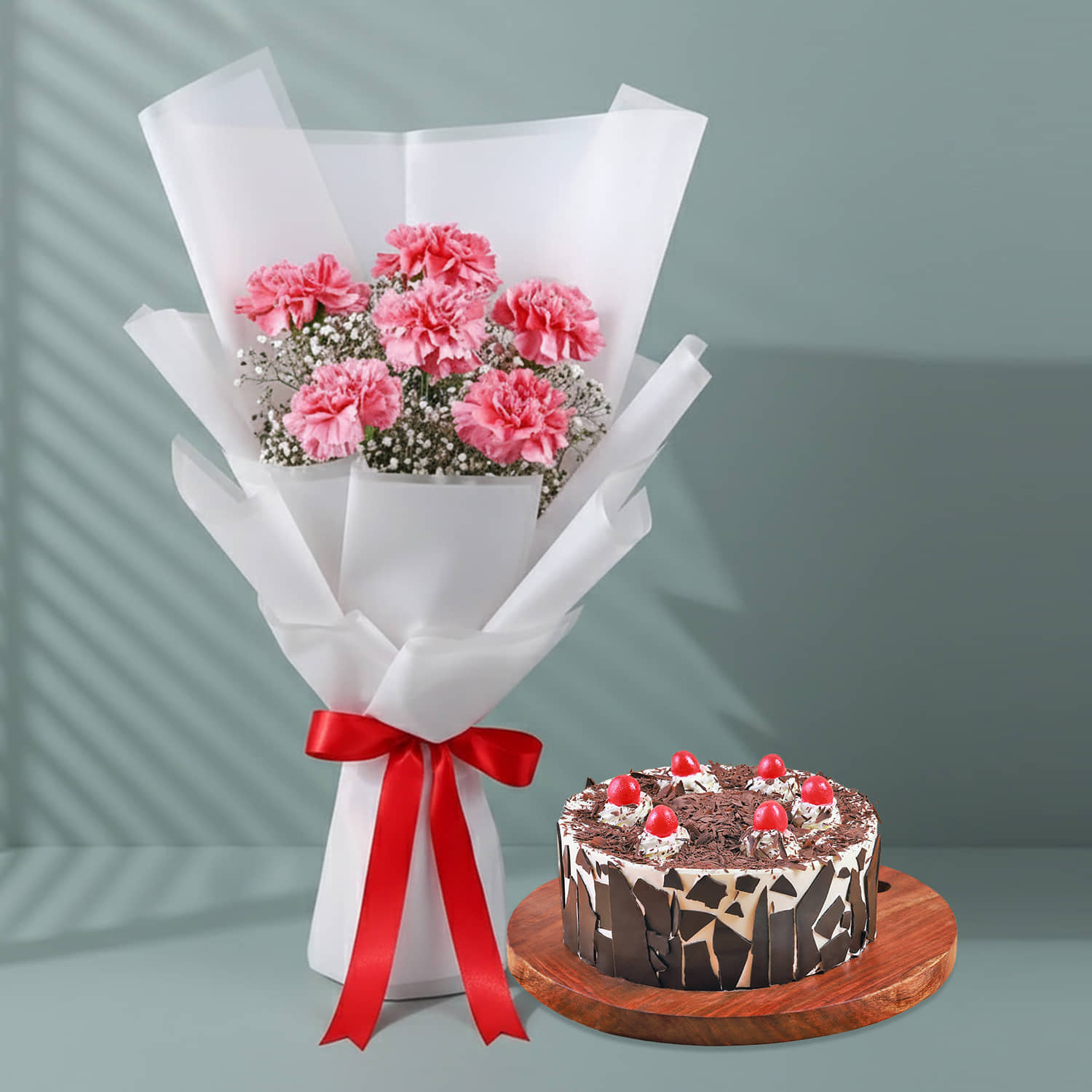 6 Pink Carnations Bouquet with Black Forest Cake |