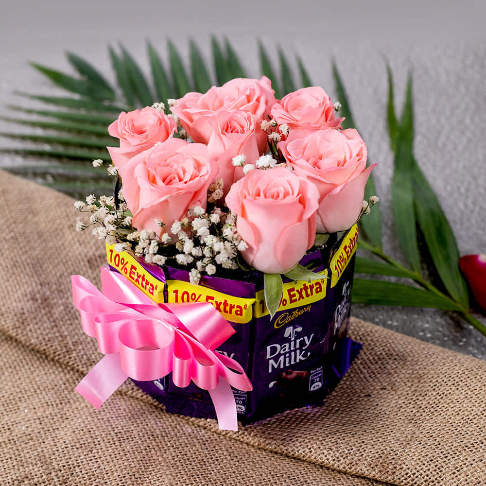 Buy Glowing With Love a Unique Combo of Roses and Chocolates |