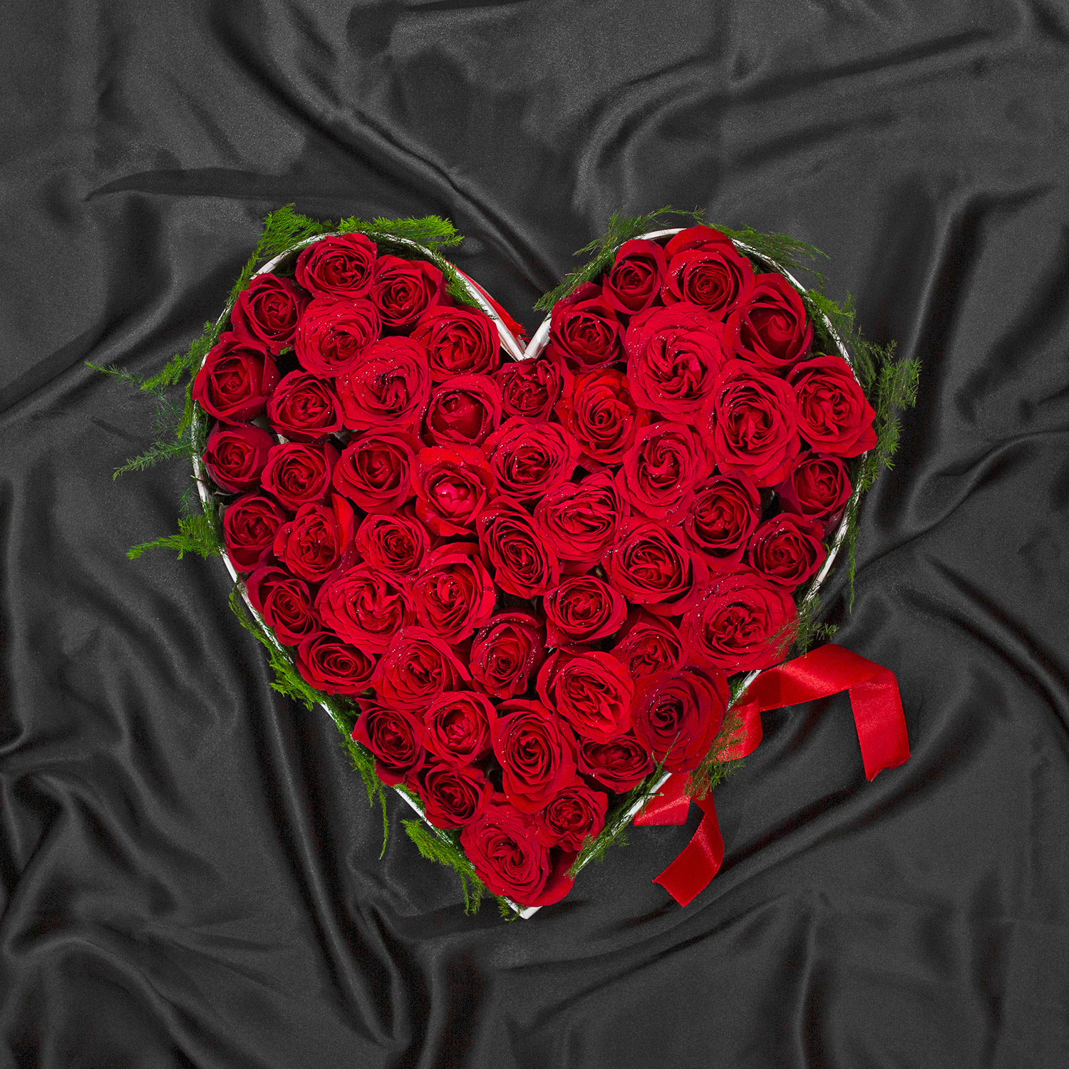 Red Roses Connecting Heart Arrangement |