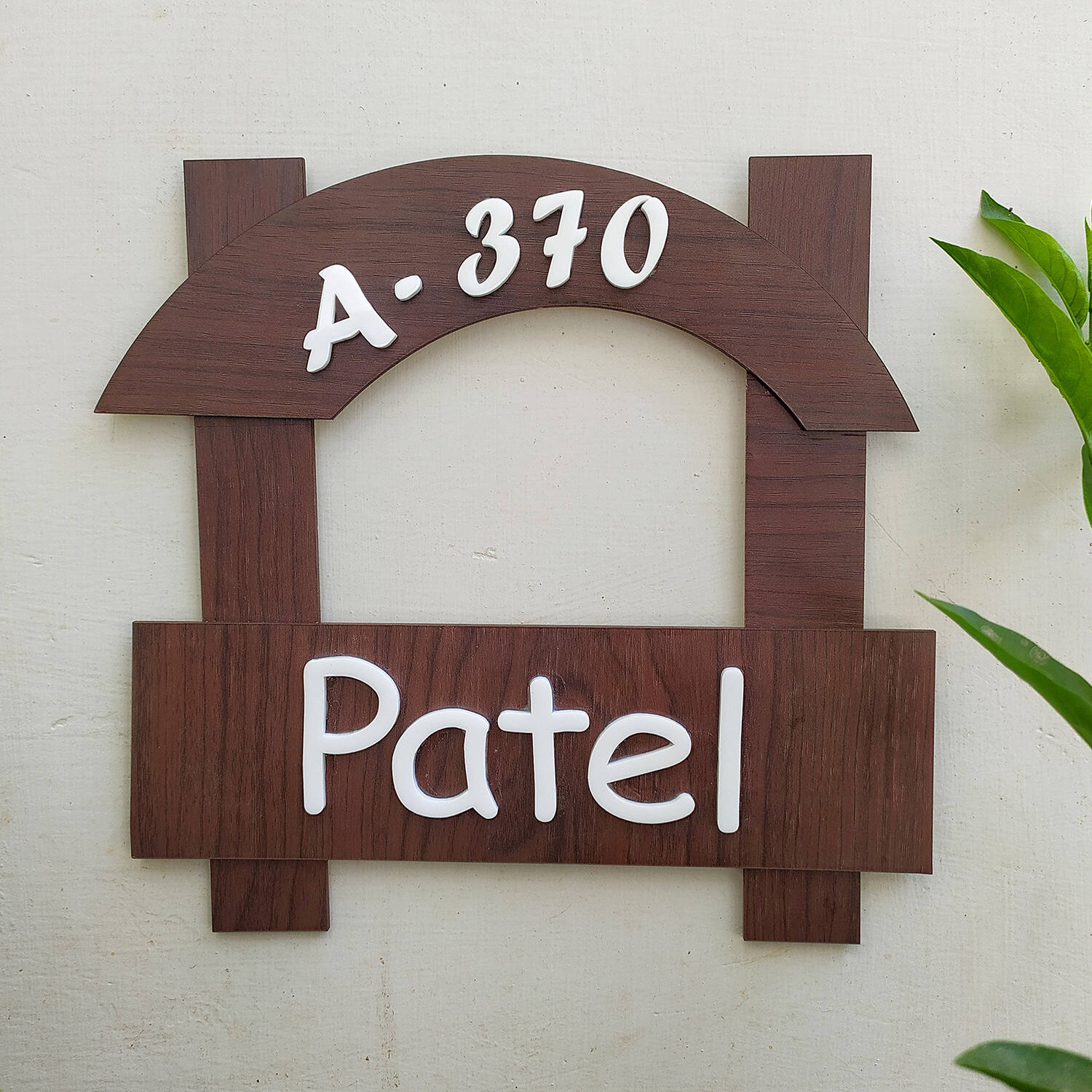 Smiling wooden name plate |